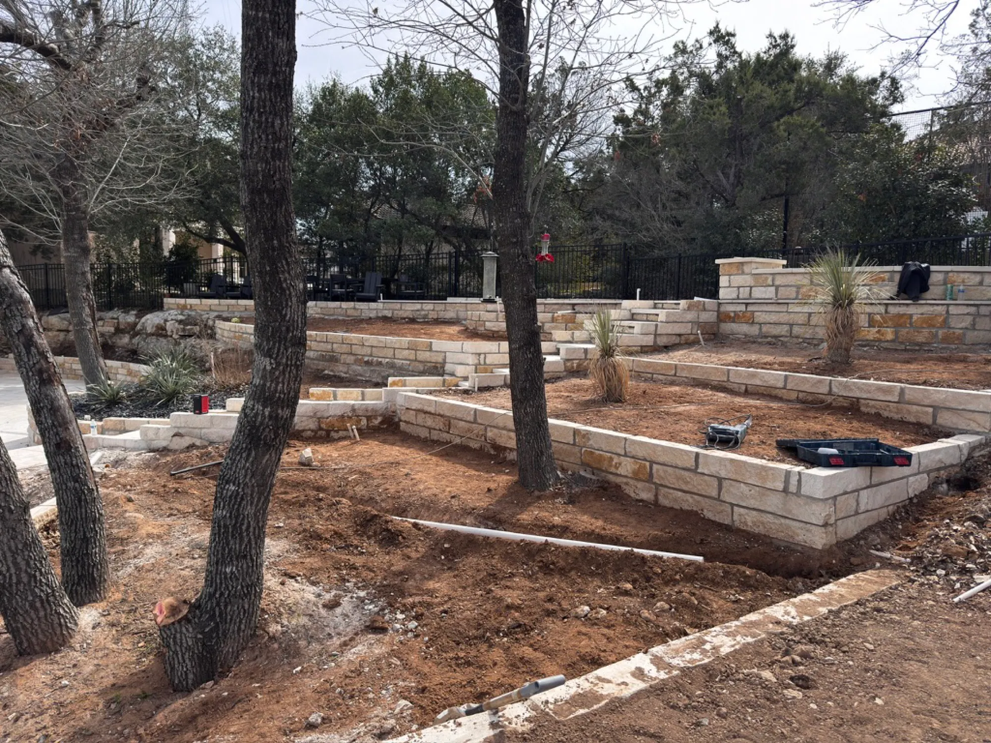 Limestone Chop Walls Going In — West Lake Hills