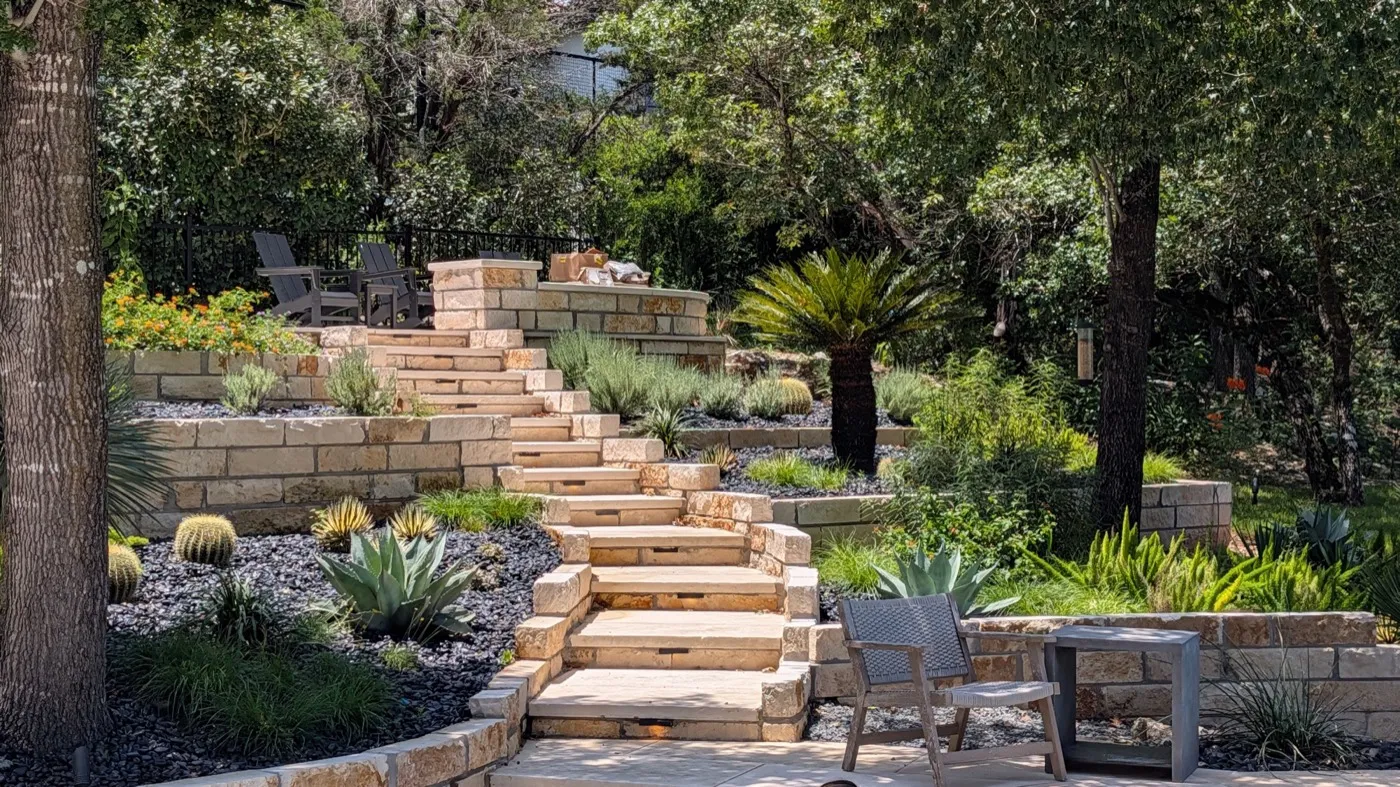 Limestone slab stairway climbing the terraced hillside at Clarion Cove