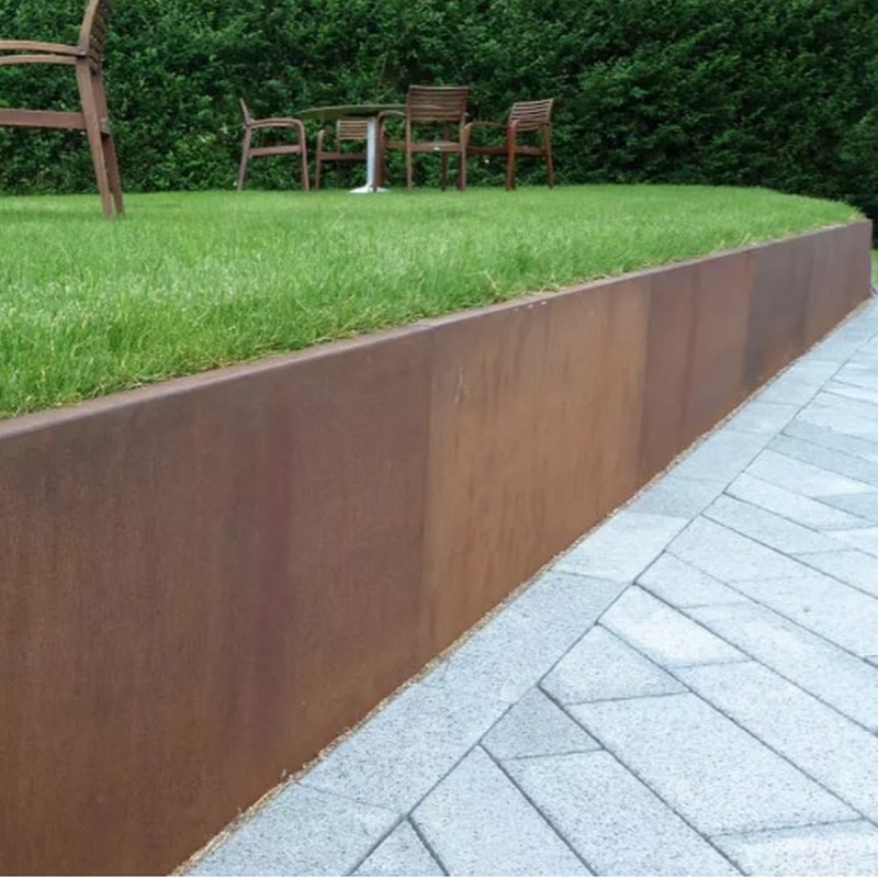 Modern retaining wall with Corten steel accents