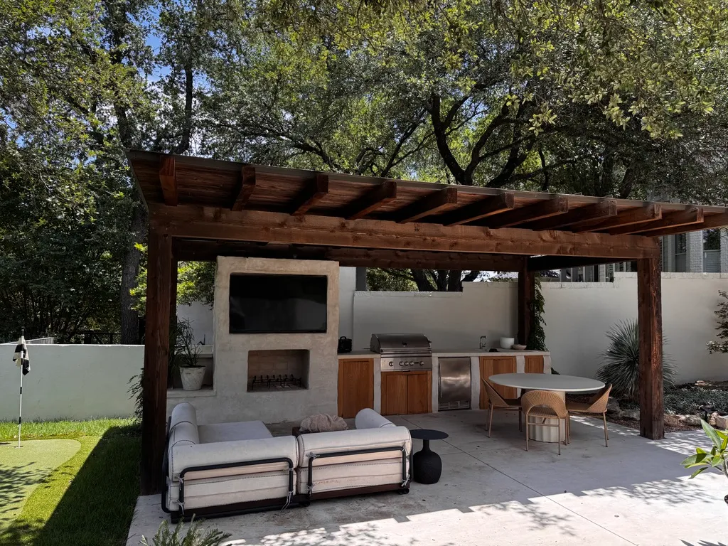 Oversized covered patio with outdoor kitchen — Dripping Springs