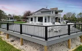 Composite deck with Ipe railing