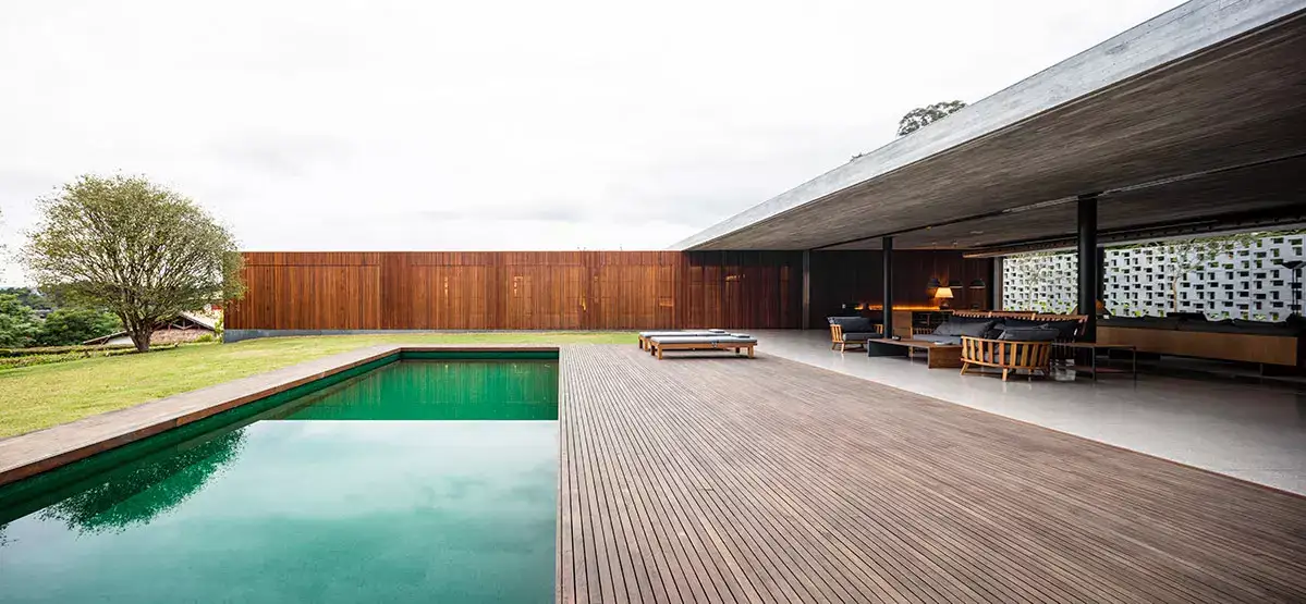 Ipe hardwood deck running alongside a pool