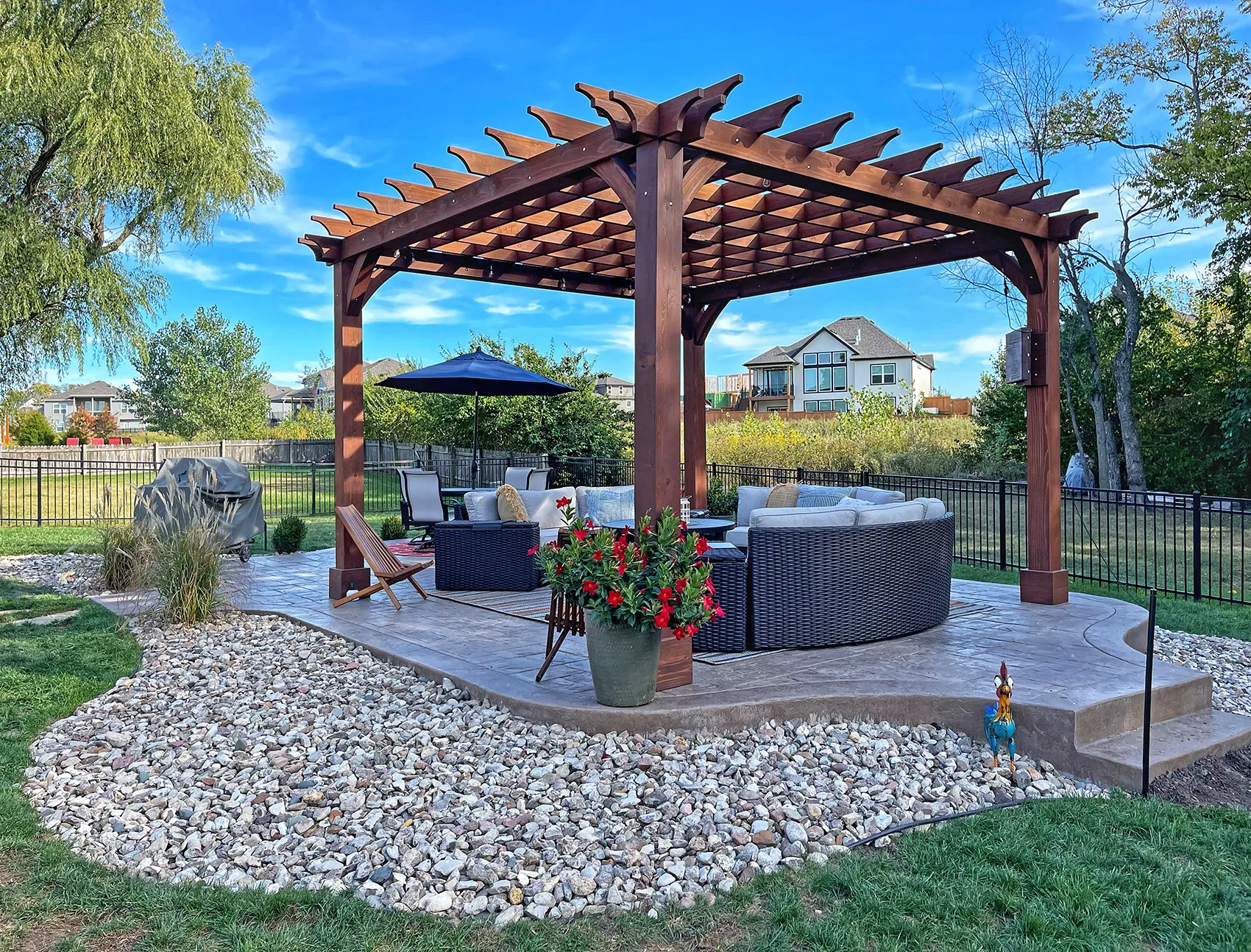Cedar pergola over outdoor seating area — Steiner Ranch