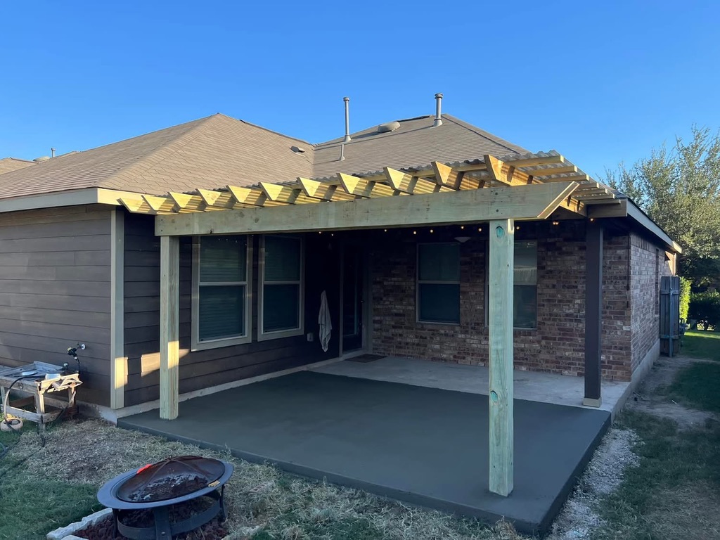 Pressure-treated pine pergola framework