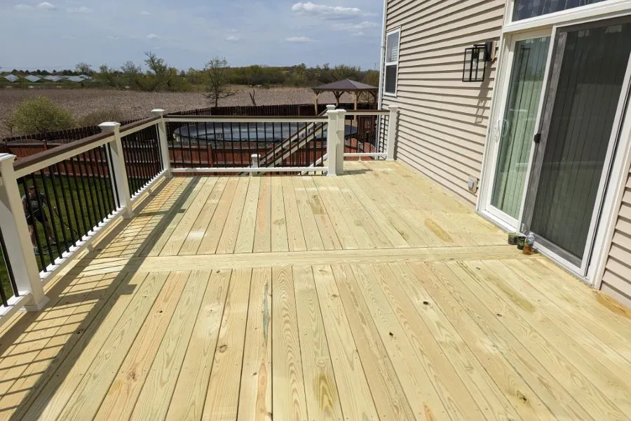 Pressure-treated deck installation