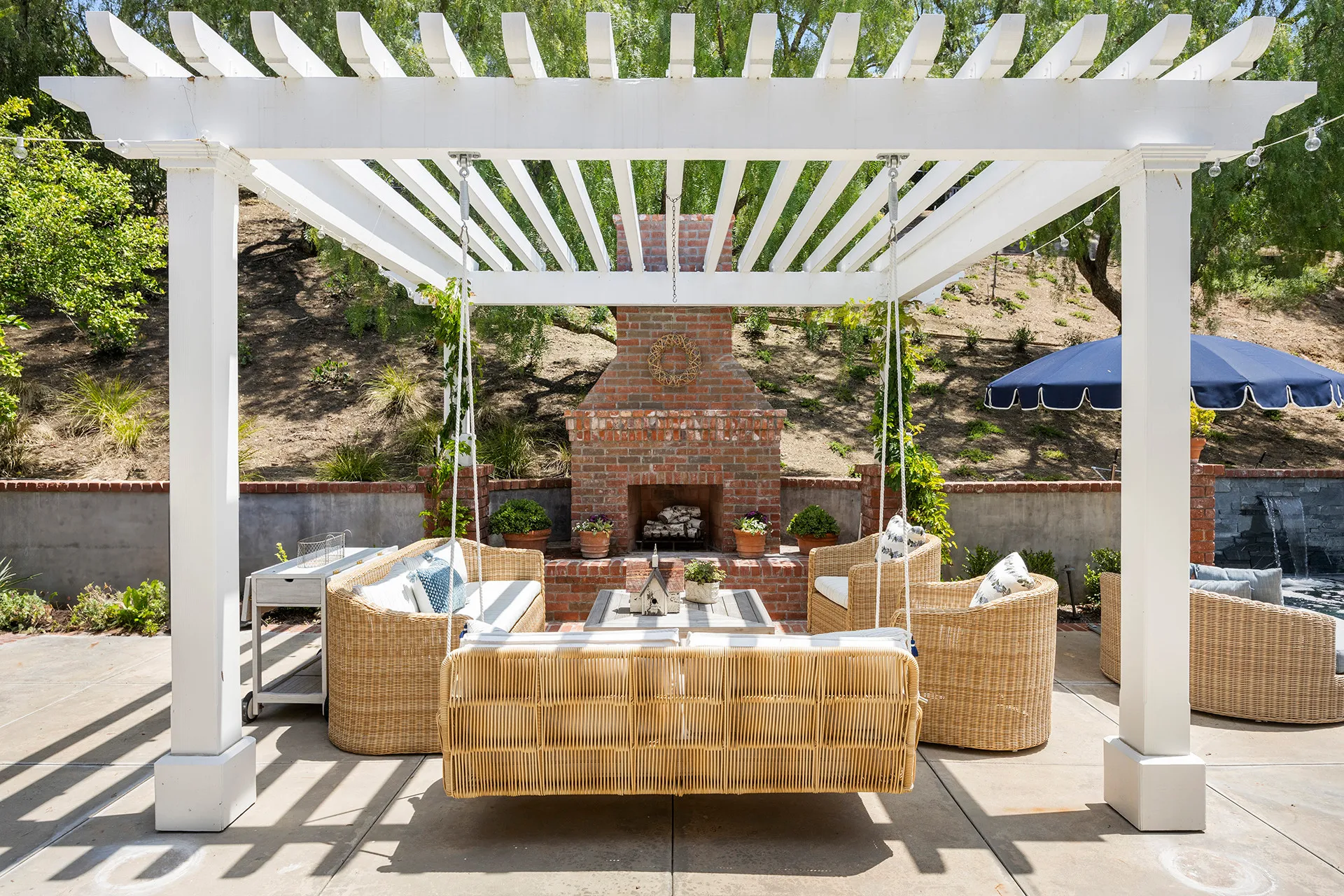 White pergola with firepit — Bee Cave