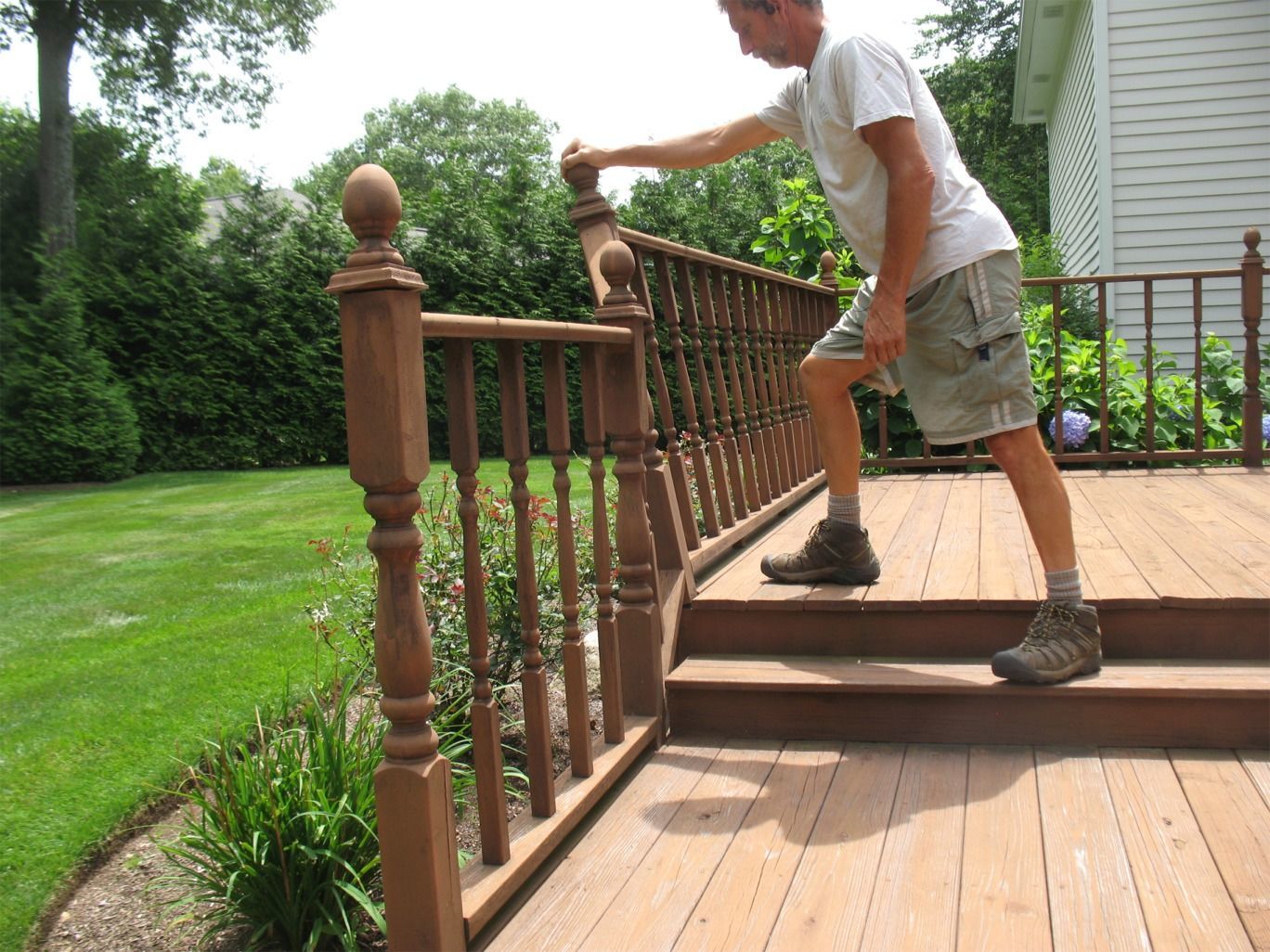 Wobbly railing as shown by someone leaning on it