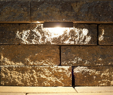Close-up of a modern retaining wall with integrated LED lighting